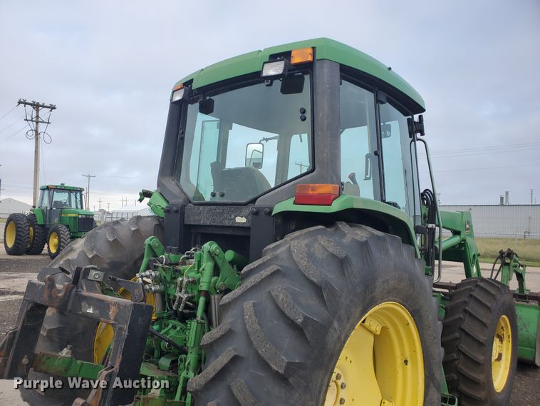 image for item DE4489 1997 John Deere 6400  MFWD tractor