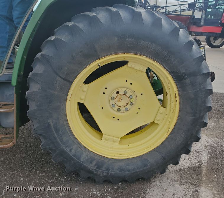 image for item DE4489 1997 John Deere 6400  MFWD tractor