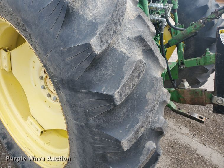 image for item DE4489 1997 John Deere 6400  MFWD tractor