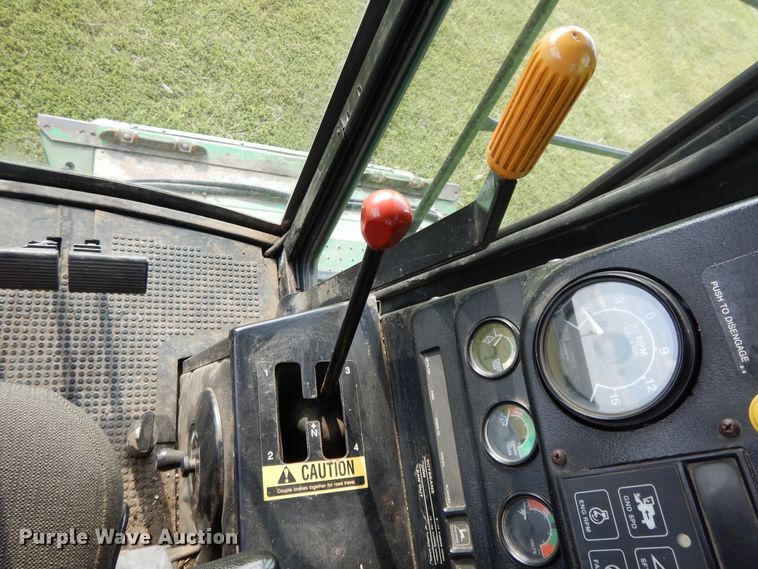 image for item DI7676 1988 John Deere 7720 Titan II RWA combine