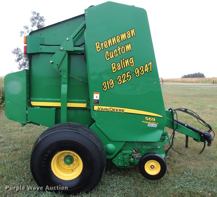 image for item GQ9125 2015 John Deere 569  round baler