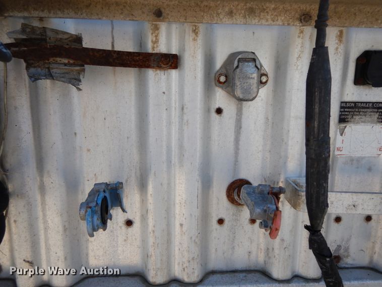 image for item HJ9563 1980 Wilson AGH-600 double hopper bottom grain trailer