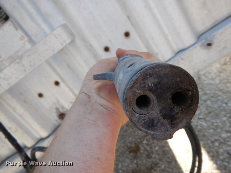 image for item HJ9563 1980 Wilson AGH-600 double hopper bottom grain trailer