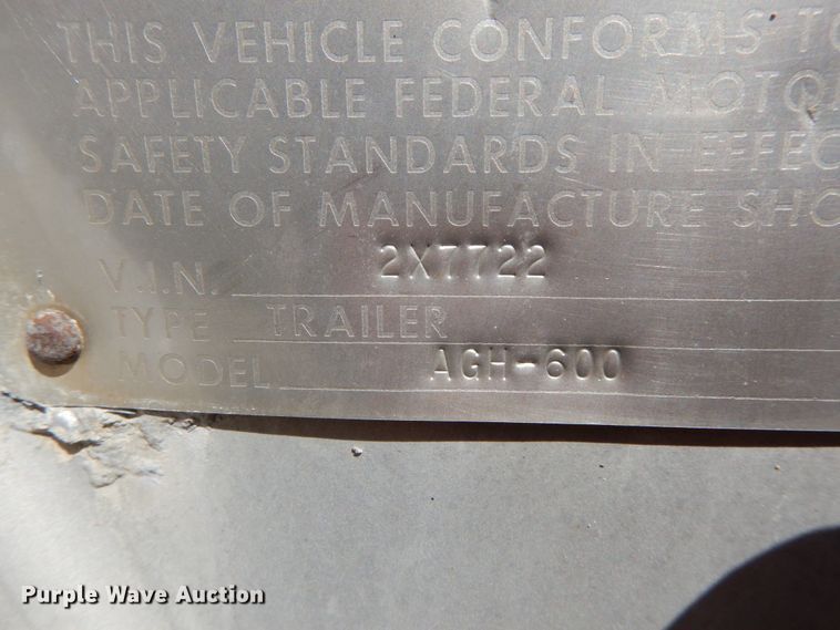 image for item HJ9563 1980 Wilson AGH-600 double hopper bottom grain trailer