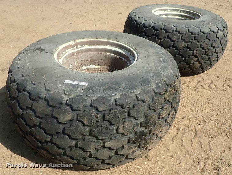 (2) Firestone 28L-26 tires and wheels in Kinsley, KS | Item HK9982 sold