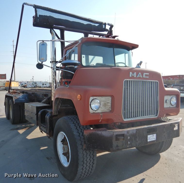 image for item DG1461 1981 Mack DM6855  roll off container truck