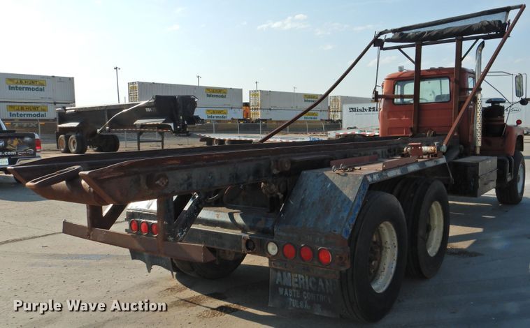 image for item DG1461 1981 Mack DM6855  roll off container truck