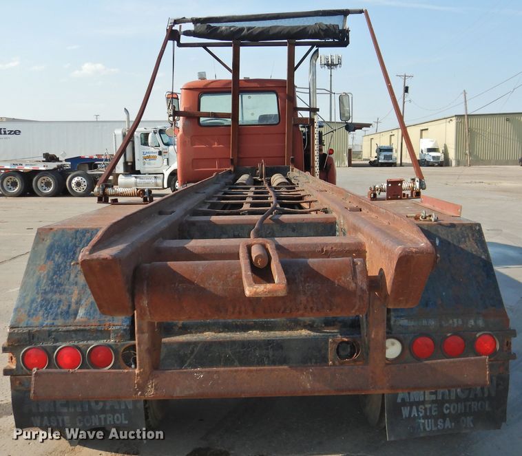 image for item DG1461 1981 Mack DM6855  roll off container truck