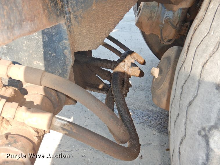 image for item DG1461 1981 Mack DM6855  roll off container truck