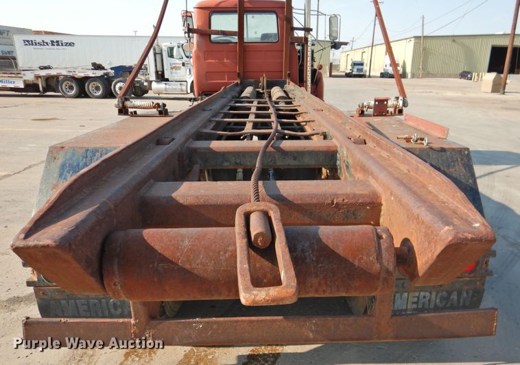 image for item DG1461 1981 Mack DM6855  roll off container truck