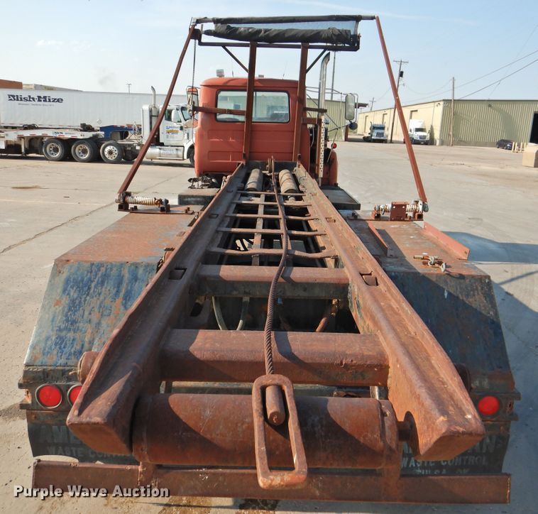 image for item DG1461 1981 Mack DM6855  roll off container truck