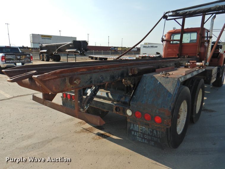 image for item DG1461 1981 Mack DM6855  roll off container truck