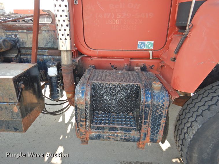 image for item DG1461 1981 Mack DM6855  roll off container truck