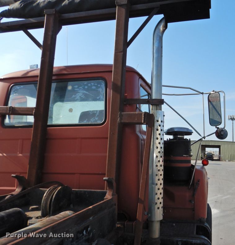 image for item DG1461 1981 Mack DM6855  roll off container truck