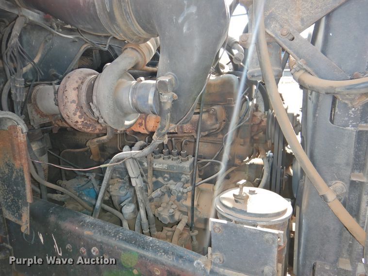 image for item DG1461 1981 Mack DM6855  roll off container truck