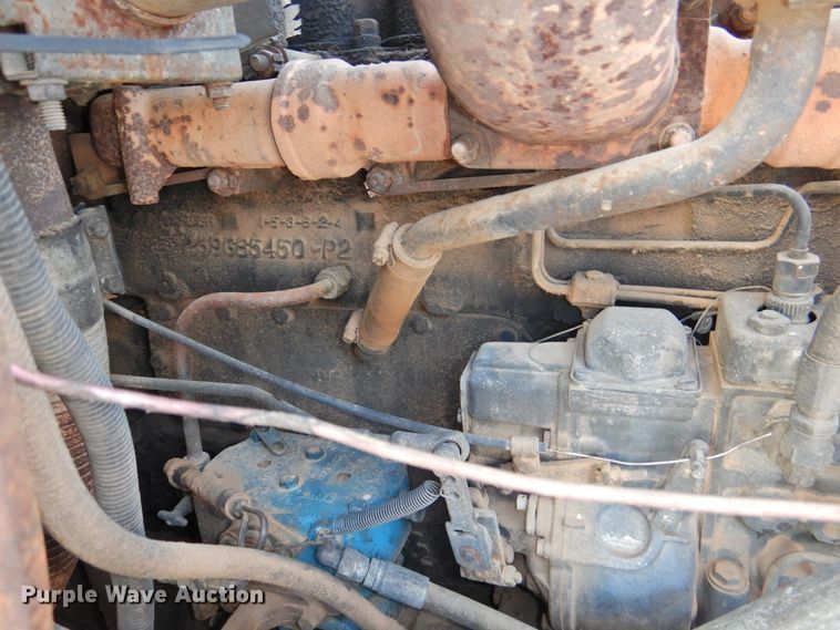 image for item DG1461 1981 Mack DM6855  roll off container truck