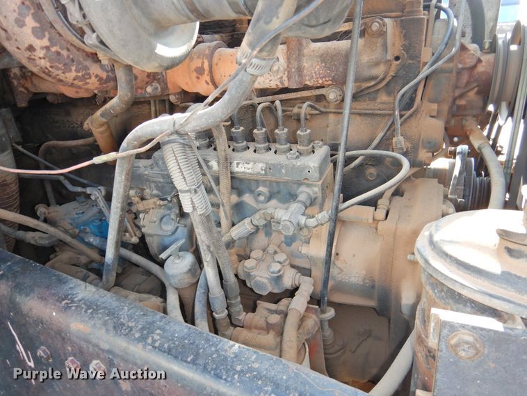 image for item DG1461 1981 Mack DM6855  roll off container truck