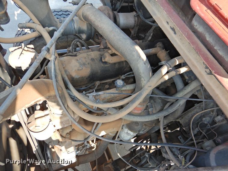 image for item DG1461 1981 Mack DM6855  roll off container truck