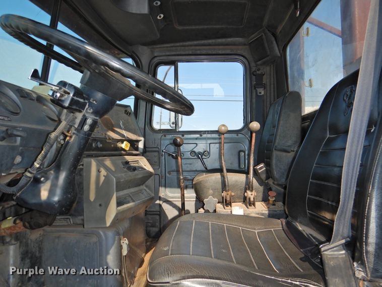 image for item DG1461 1981 Mack DM6855  roll off container truck