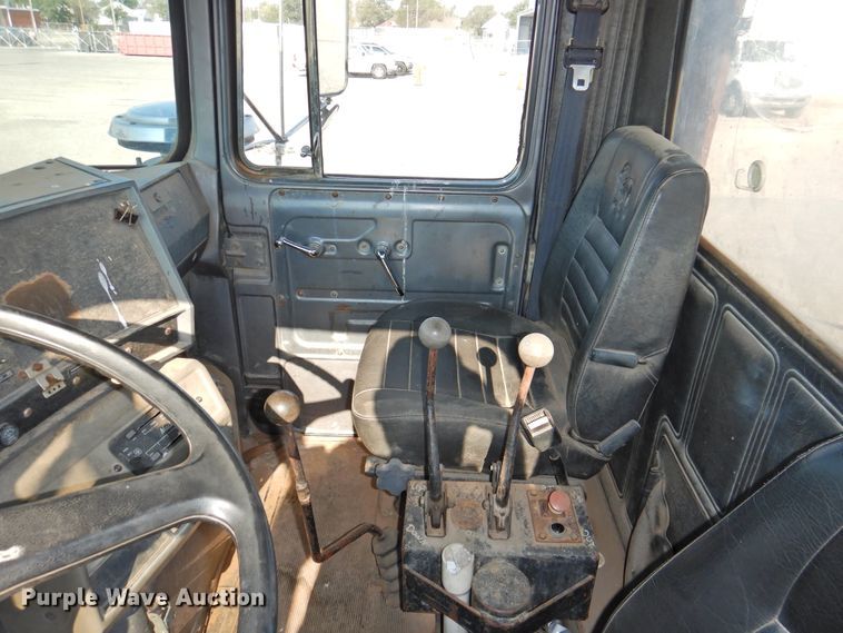 image for item DG1461 1981 Mack DM6855  roll off container truck