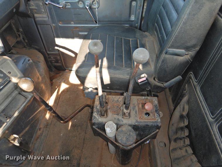 image for item DG1461 1981 Mack DM6855  roll off container truck