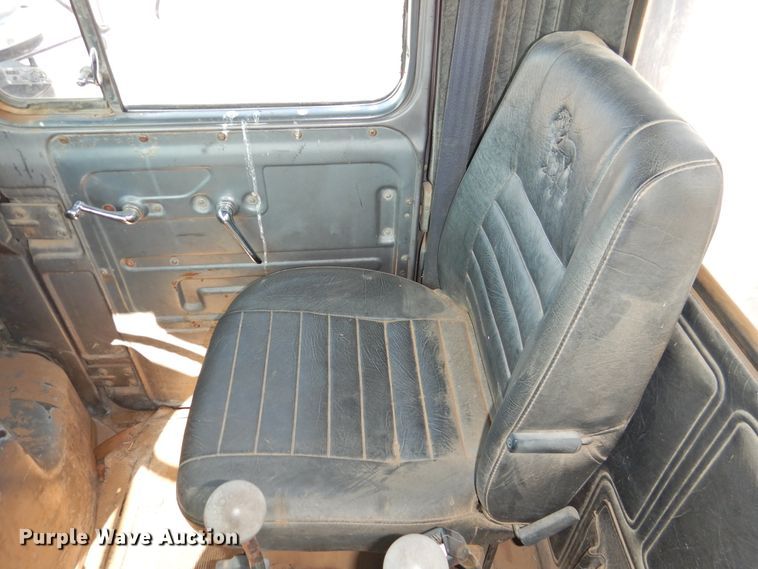 image for item DG1461 1981 Mack DM6855  roll off container truck