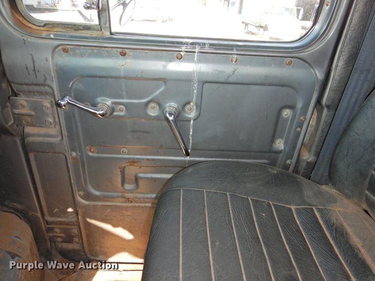 image for item DG1461 1981 Mack DM6855  roll off container truck