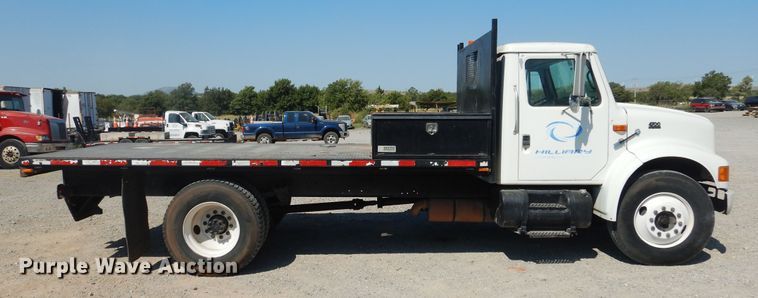 image for item DG1469 1999 International 4700  flatbed truck