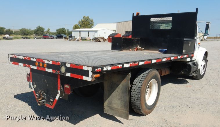 image for item DG1469 1999 International 4700  flatbed truck