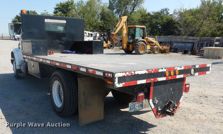 image for item DG1469 1999 International 4700  flatbed truck