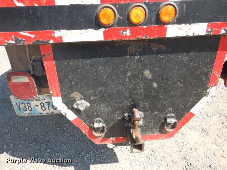 image for item DG1469 1999 International 4700  flatbed truck