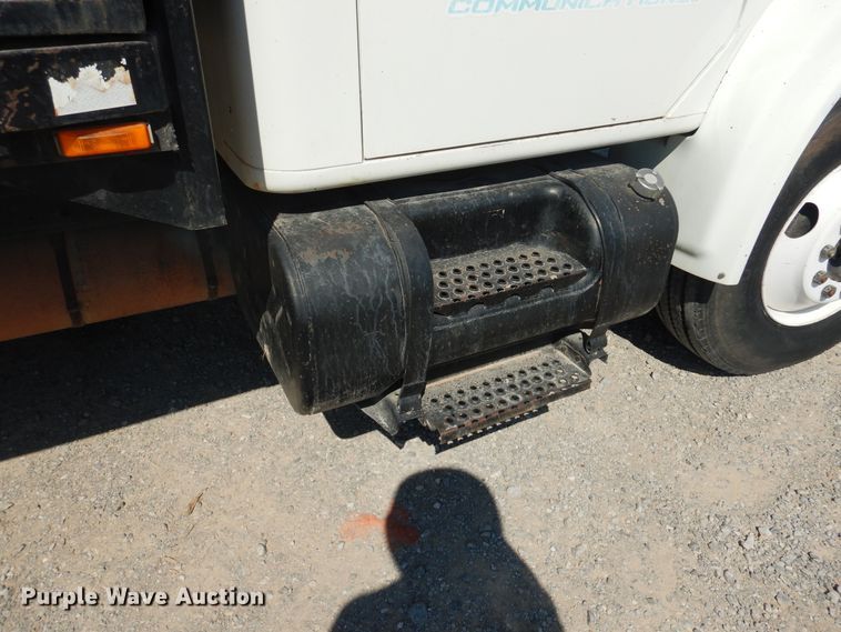 image for item DG1469 1999 International 4700  flatbed truck