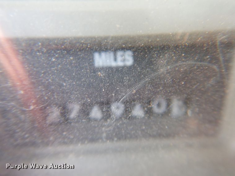 image for item DG1469 1999 International 4700  flatbed truck