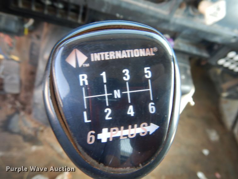 image for item DG1469 1999 International 4700  flatbed truck