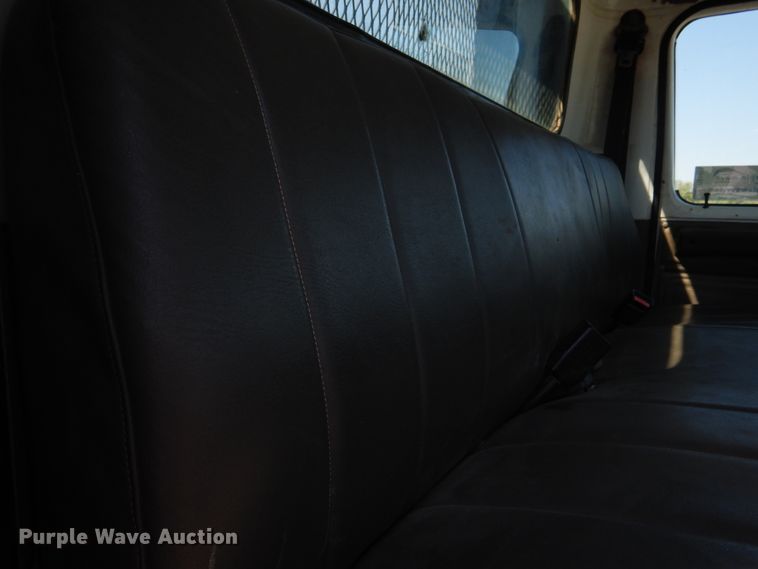 image for item DG1469 1999 International 4700  flatbed truck