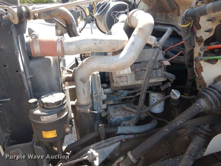 image for item DG1469 1999 International 4700  flatbed truck