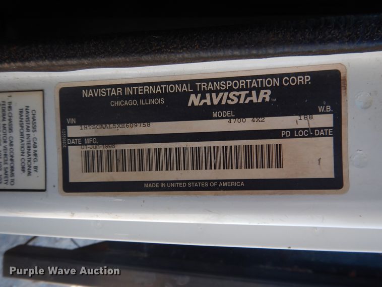 image for item DG1469 1999 International 4700  flatbed truck