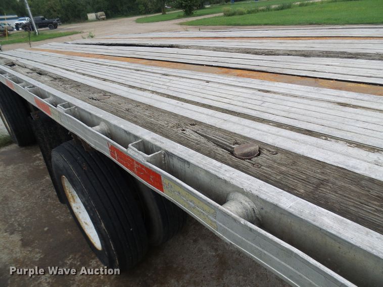 image for item EP9910 1999 Utility FS2CHA flatbed trailer