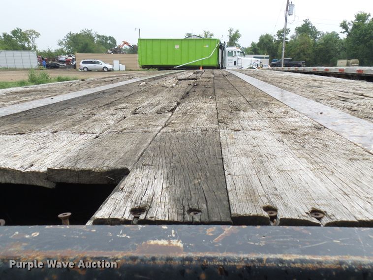 image for item EP9912 2006 Transcraft TL2000H flatbed trailer