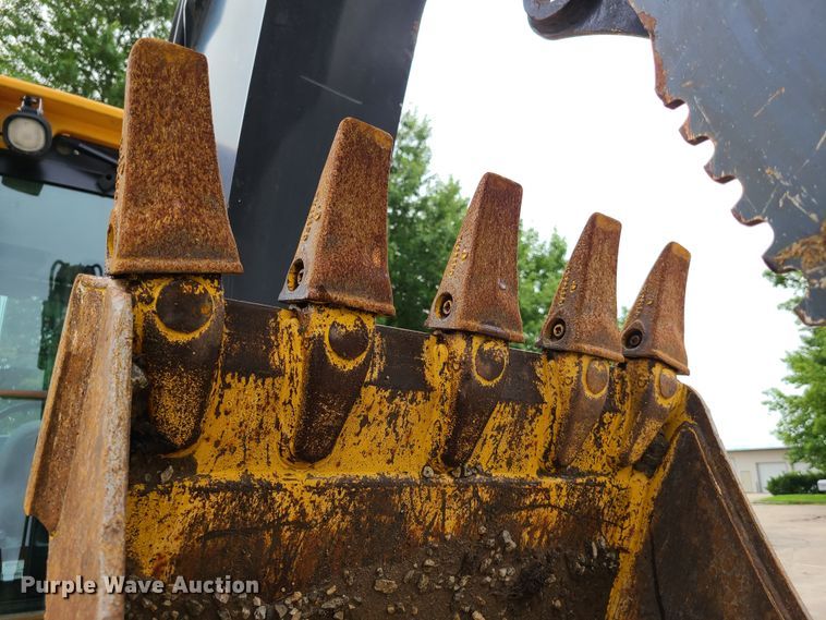 image for item EL9951 2015 John Deere 310SK  backhoe