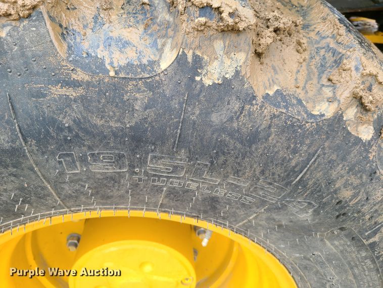 image for item EL9951 2015 John Deere 310SK  backhoe