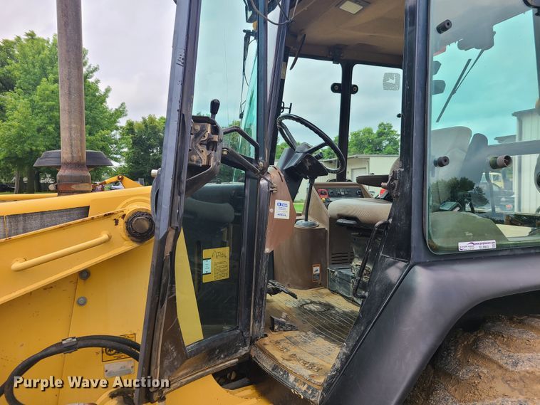 image for item EL9953 2000 John Deere 310E  backhoe