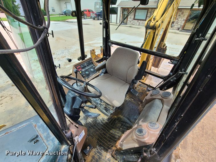 image for item EL9953 2000 John Deere 310E  backhoe