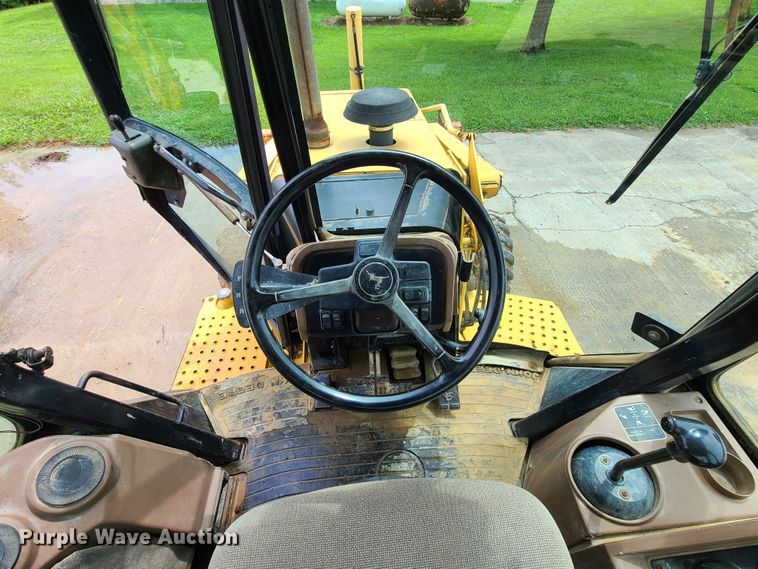 image for item EL9953 2000 John Deere 310E  backhoe