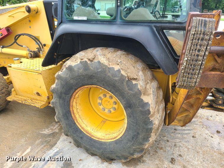image for item EL9953 2000 John Deere 310E  backhoe