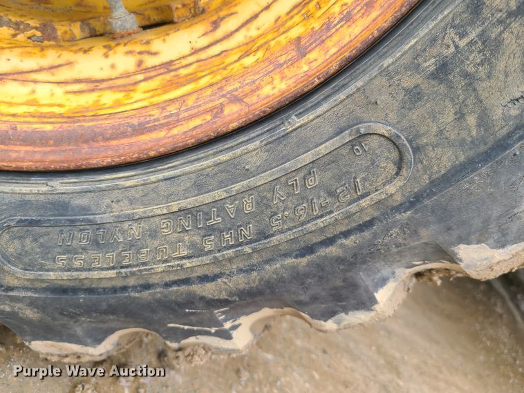 image for item EL9953 2000 John Deere 310E  backhoe