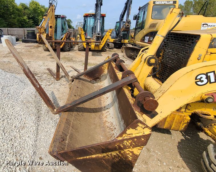 image for item EL9953 2000 John Deere 310E  backhoe