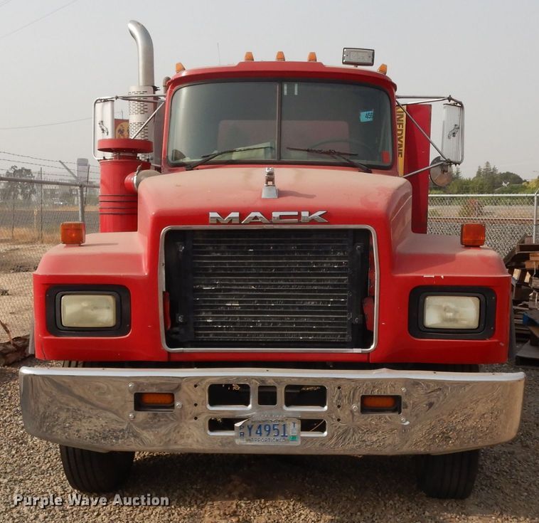 image for item DJ6505 1993 Mack RD688S  flatbed truck with fluid mixing system