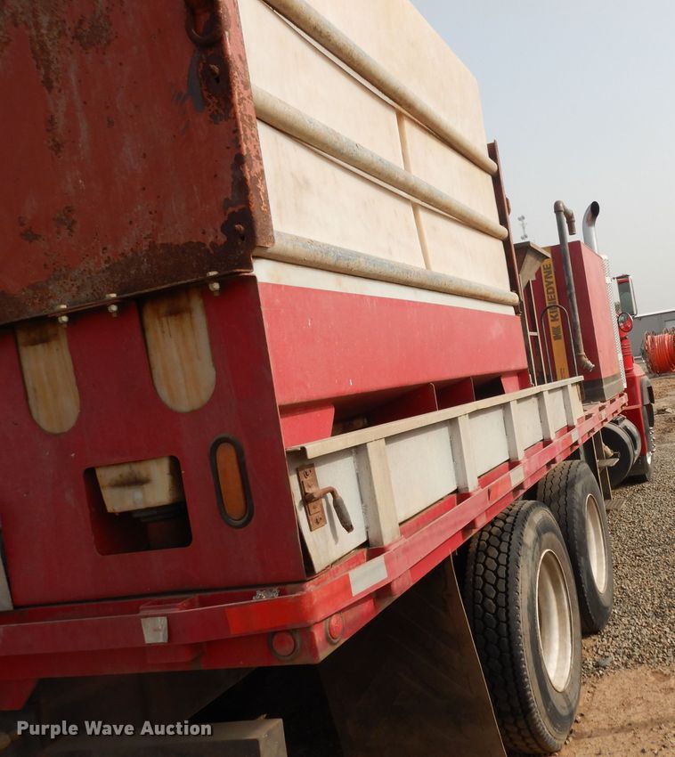 image for item DJ6505 1993 Mack RD688S  flatbed truck with fluid mixing system