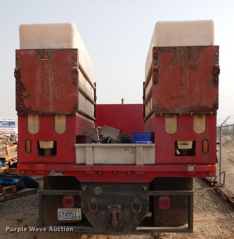 image for item DJ6505 1993 Mack RD688S  flatbed truck with fluid mixing system